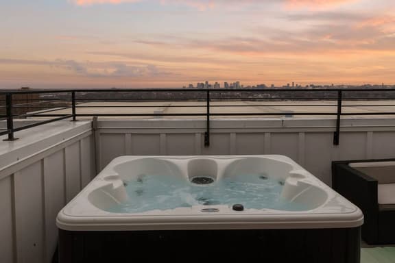 Peaceful 4-story retreat • Rooftop hot tub + Views - Image 1